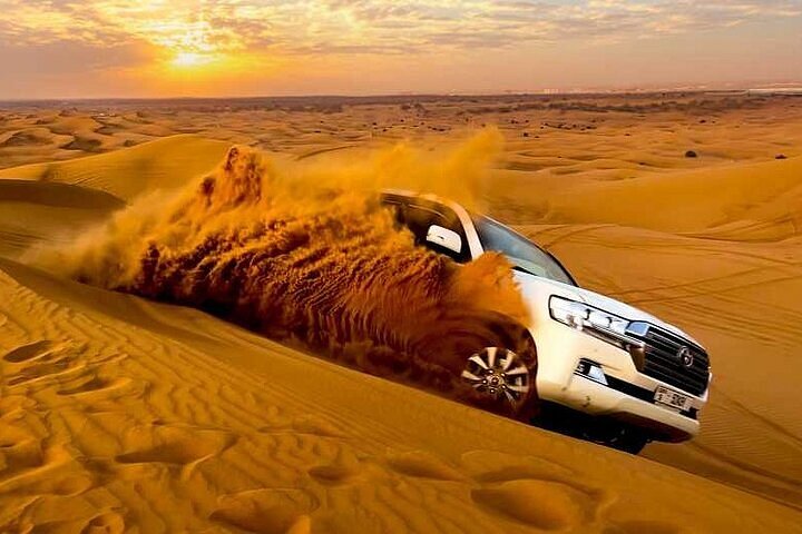 4x4 dune bashing experience on Liwa Overnight Desert Safari tour