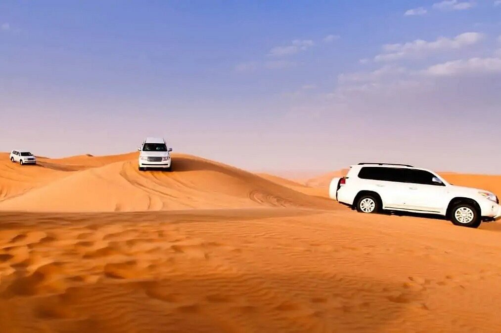 Dubai Desert Safari Booking Guide sandboarding