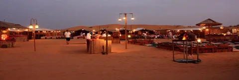 Luxury campsite setup during Liwa Overnight Desert Safari adventure