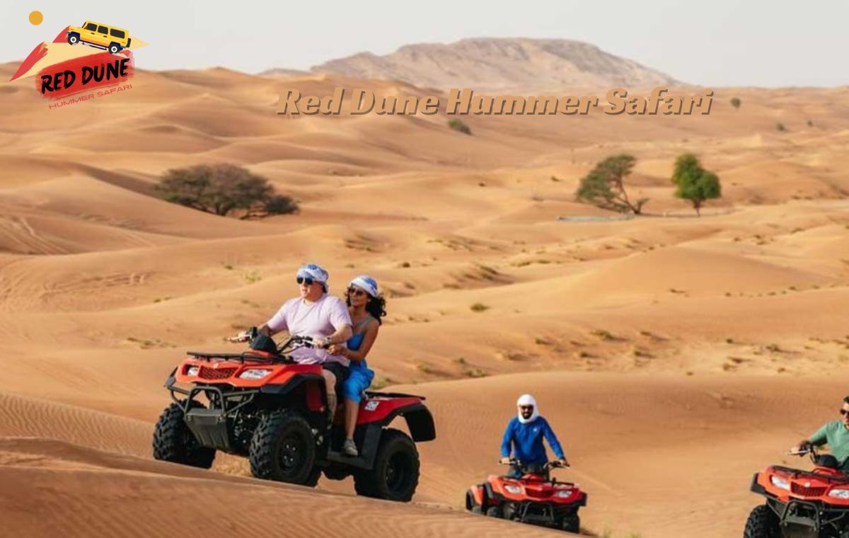 Thrilling quad biking across the Lahbab red dunes on a Red Dune Desert Safari in Dubai